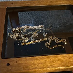 Mix of gold and silver necklaces and bracelets